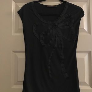 Black dressy top with ribbon embellishment