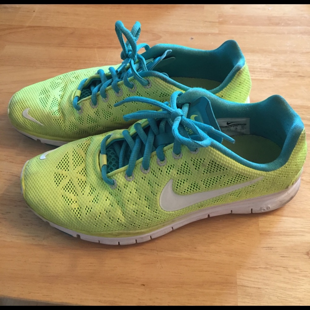 Bright yellow and teal Nike Frees