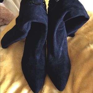 Tall black suede boots