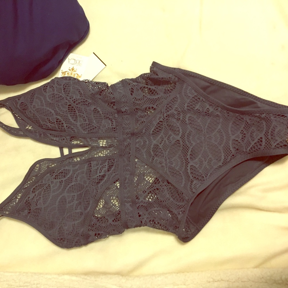 One piece swimsuit,never worn. Price or best offer