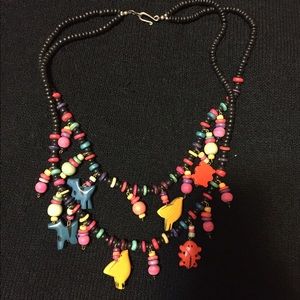 Playful wooden charm necklace
