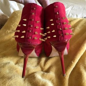 Red suede, gold spike platform booties