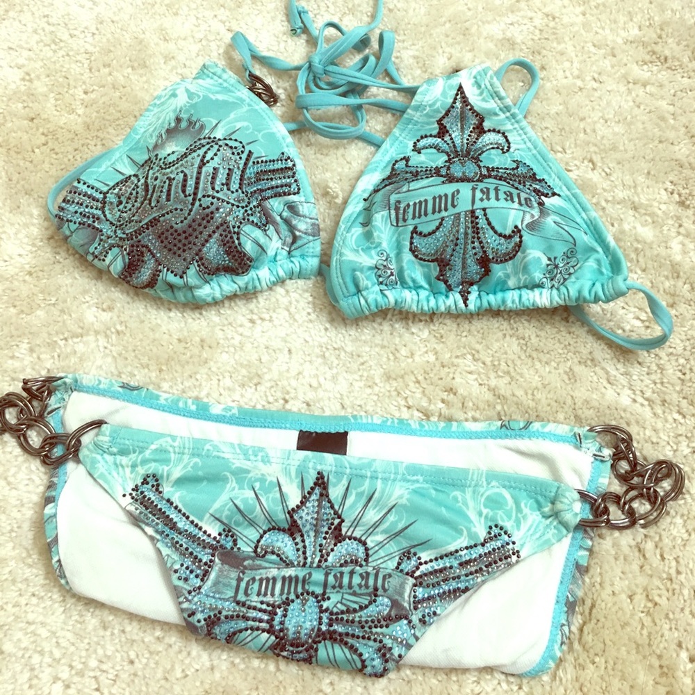 Sinful suit! Teal color with black & silver bling
