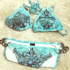 Sinful suit! Teal color with black & silver bling