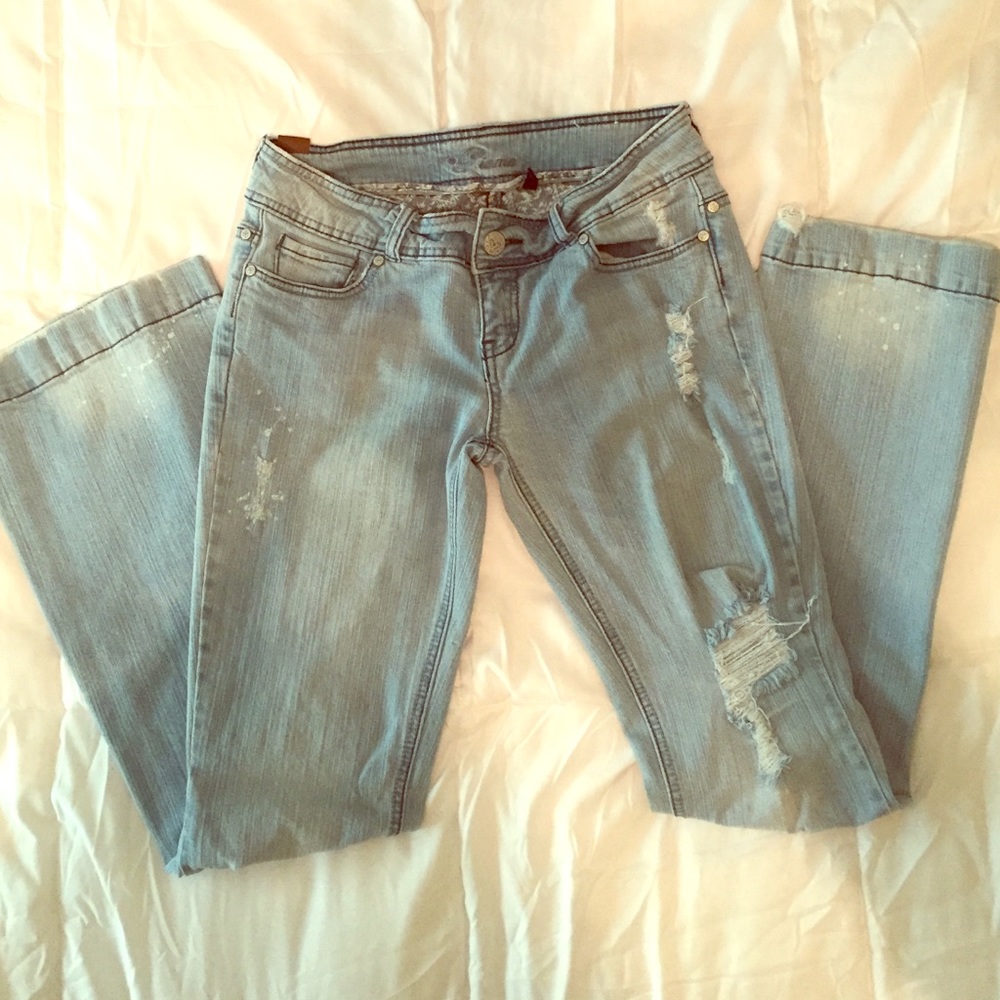 Light colored Denim stretchy Jeans. Boot leg flare