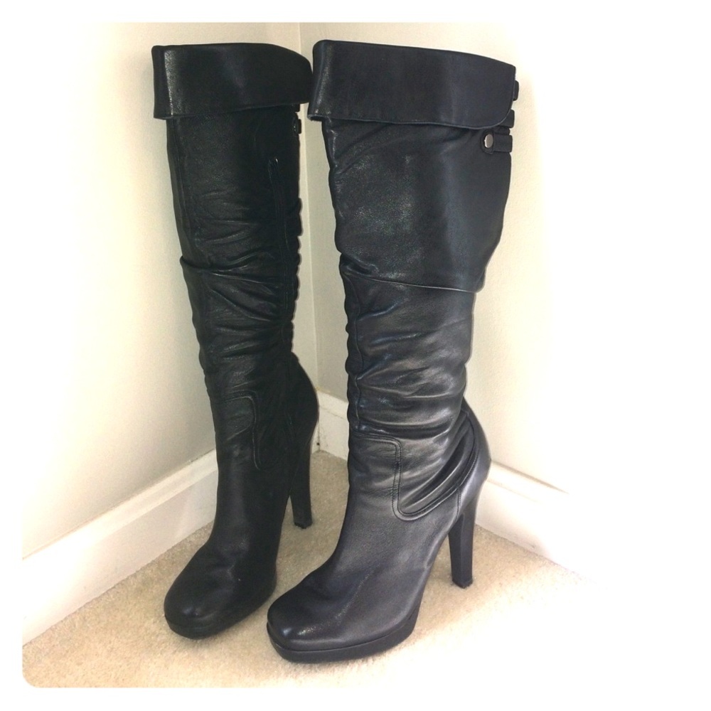 Black leather Jessica Simpson knee high boots.