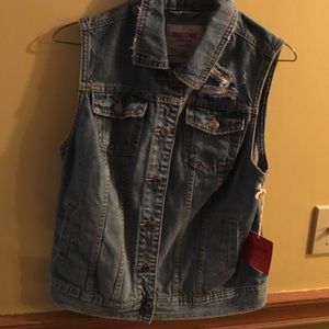 Size medium distressed denim vest