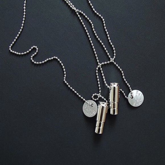 Silver Fighting Hunger Bullet Necklace - Picture 6 of 6