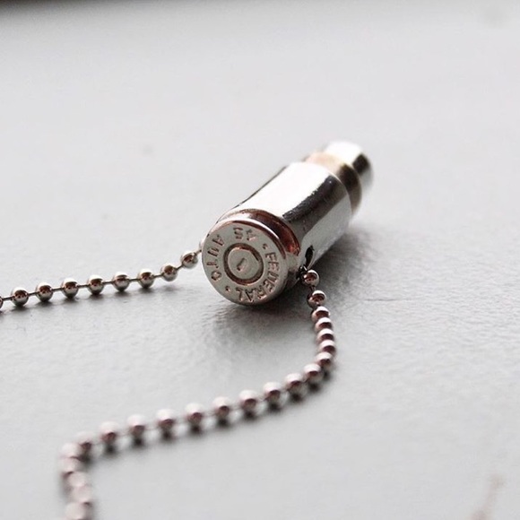 Silver Fighting Hunger Bullet Necklace - Picture 5 of 6