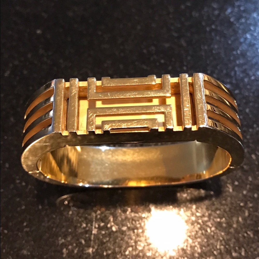 Tory Burch gold Fitbit cover