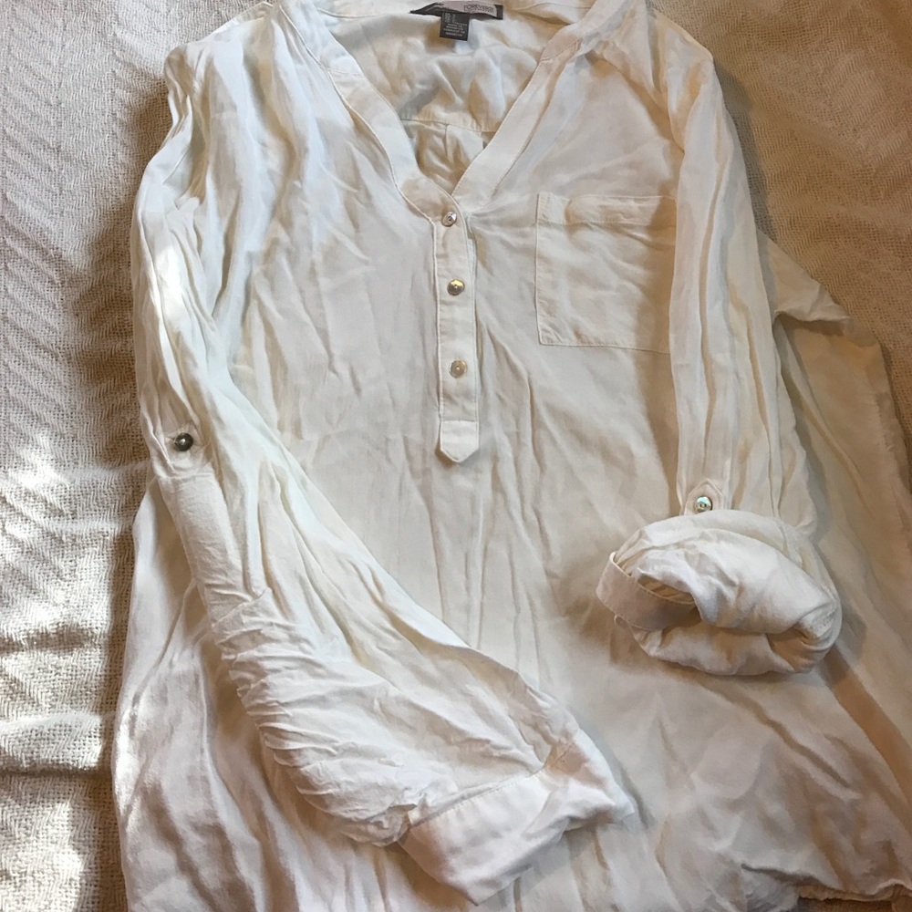 Cream shirt - dress up or down.
