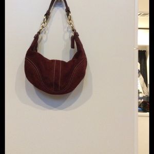 Burgundy suede Coach bag