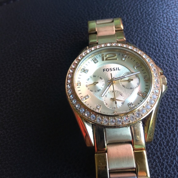 Gold fossil watch main image 3
