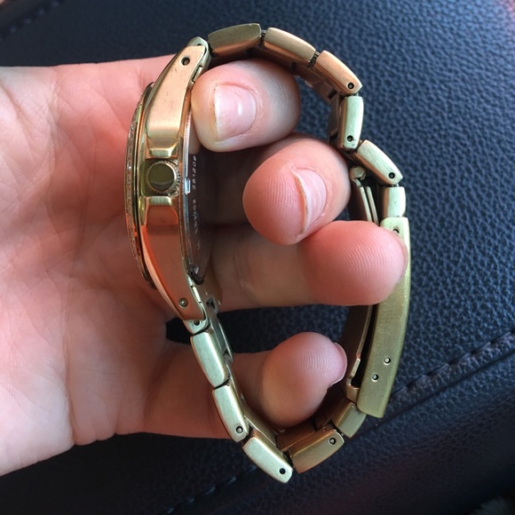 Gold fossil watch