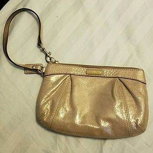 Coach gold wristlet