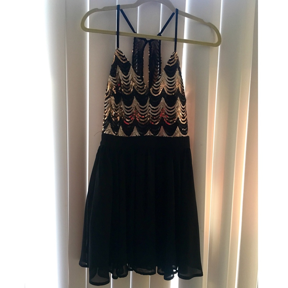 Black and gold tone sequin cocktail dress