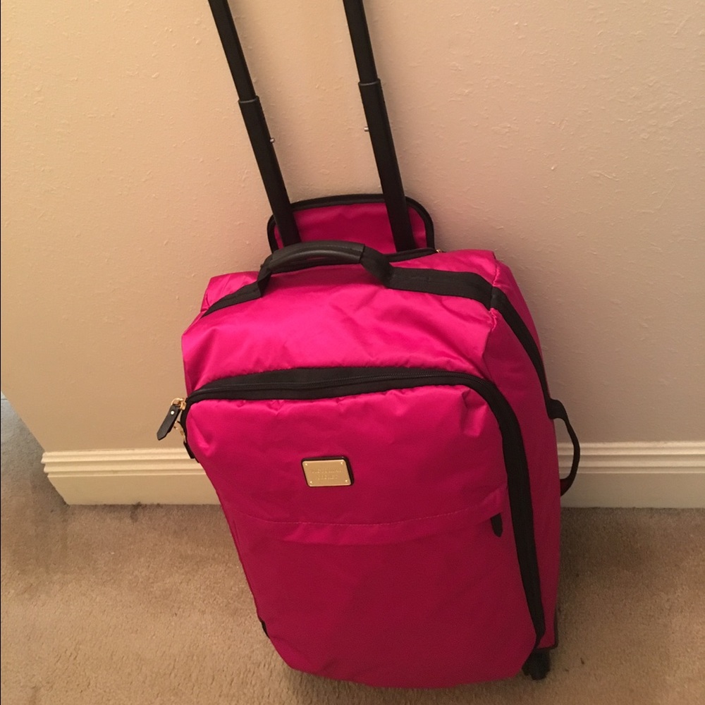 Brand new Victoria's Secret Fuchsia carryon