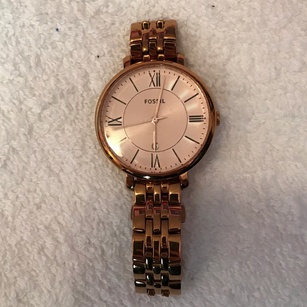 Gold Fossil watch