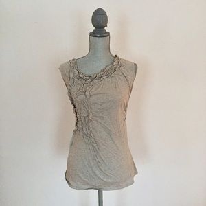 Sleeveless top with neckline and front details
