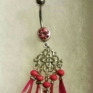 Belly ring with feathers