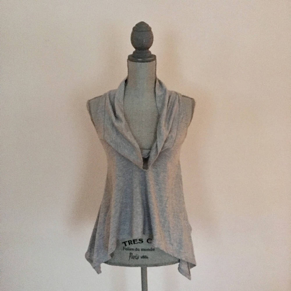 Sleeveless flare top with draped neckline