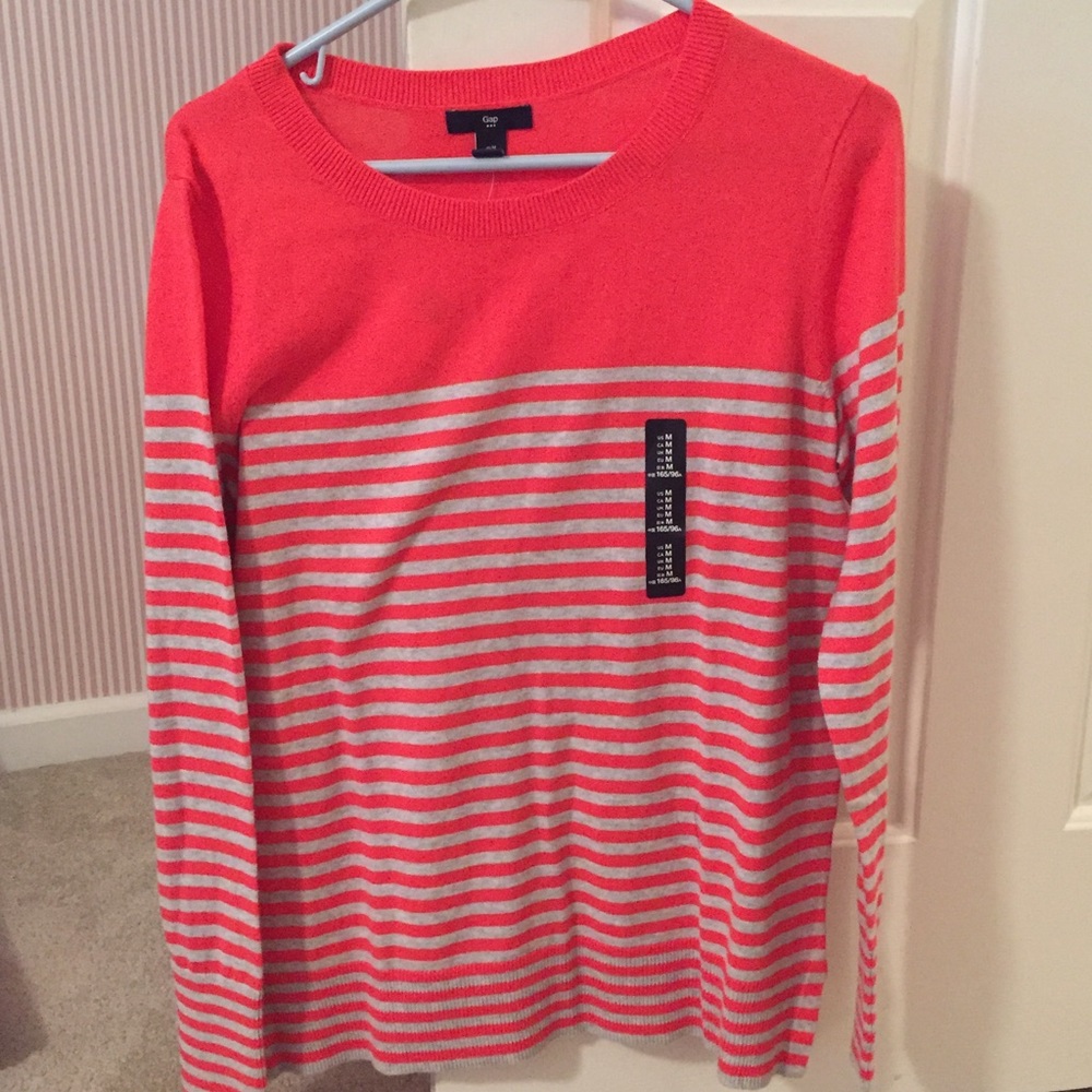 Red and grey striped sweater