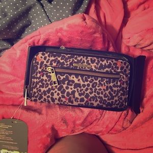 NWT Travelon cheetah wallet.