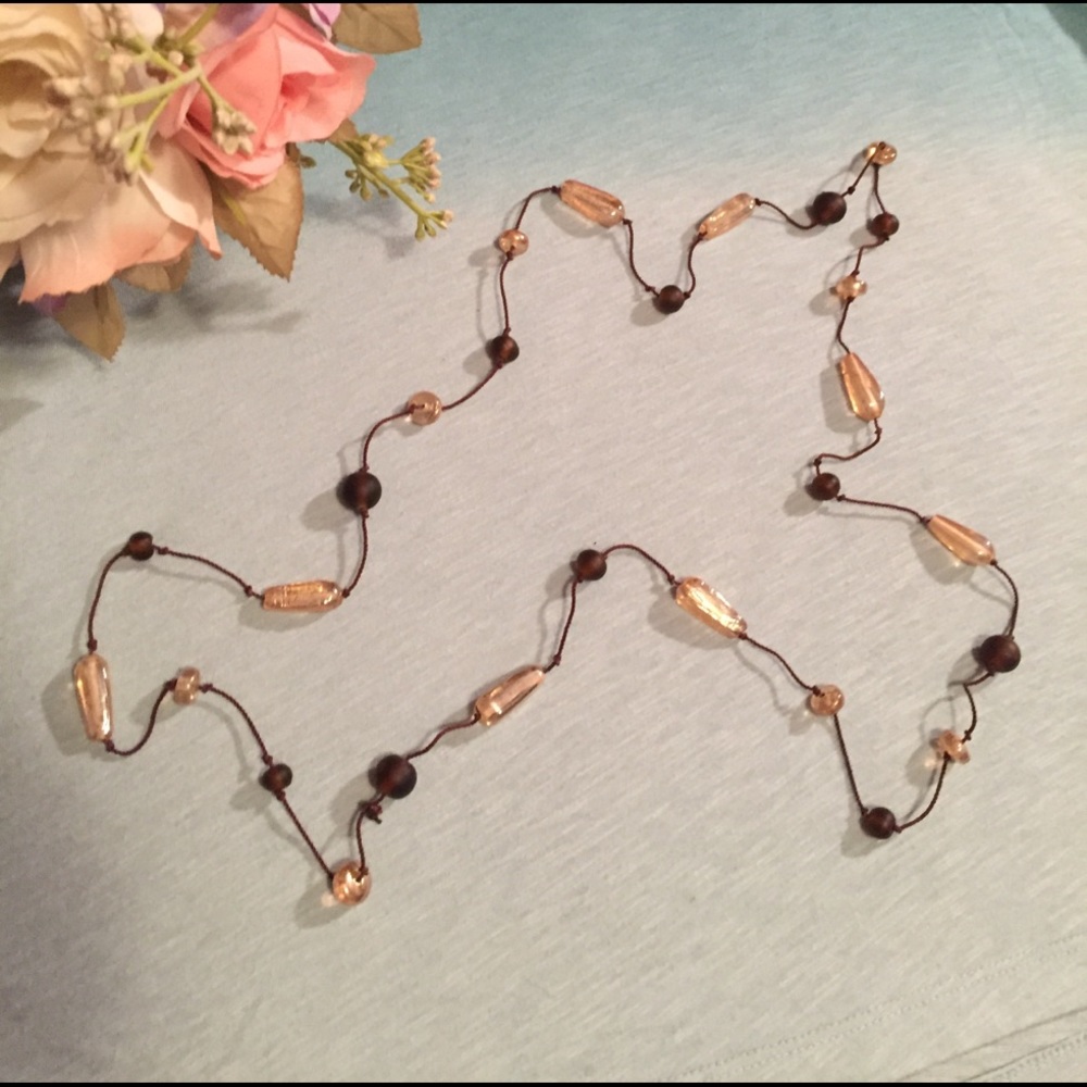Brown and cream colored beaded necklace
