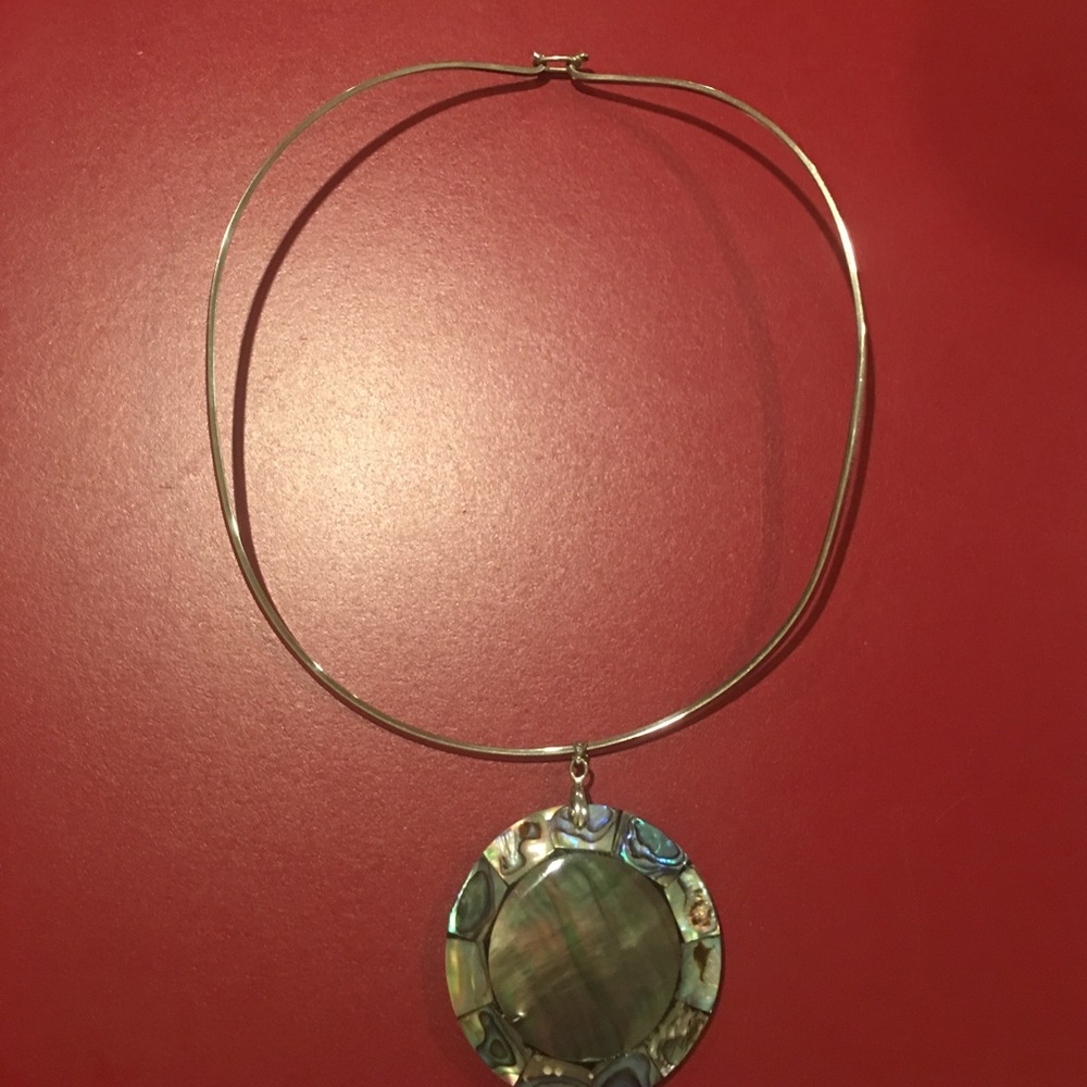 Silver necklace with charm