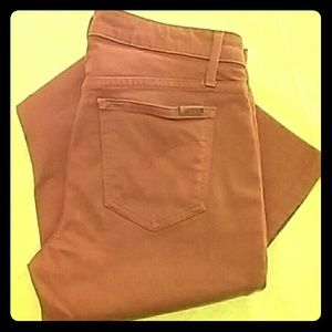 Rust/pumpkin colored skinny jeans