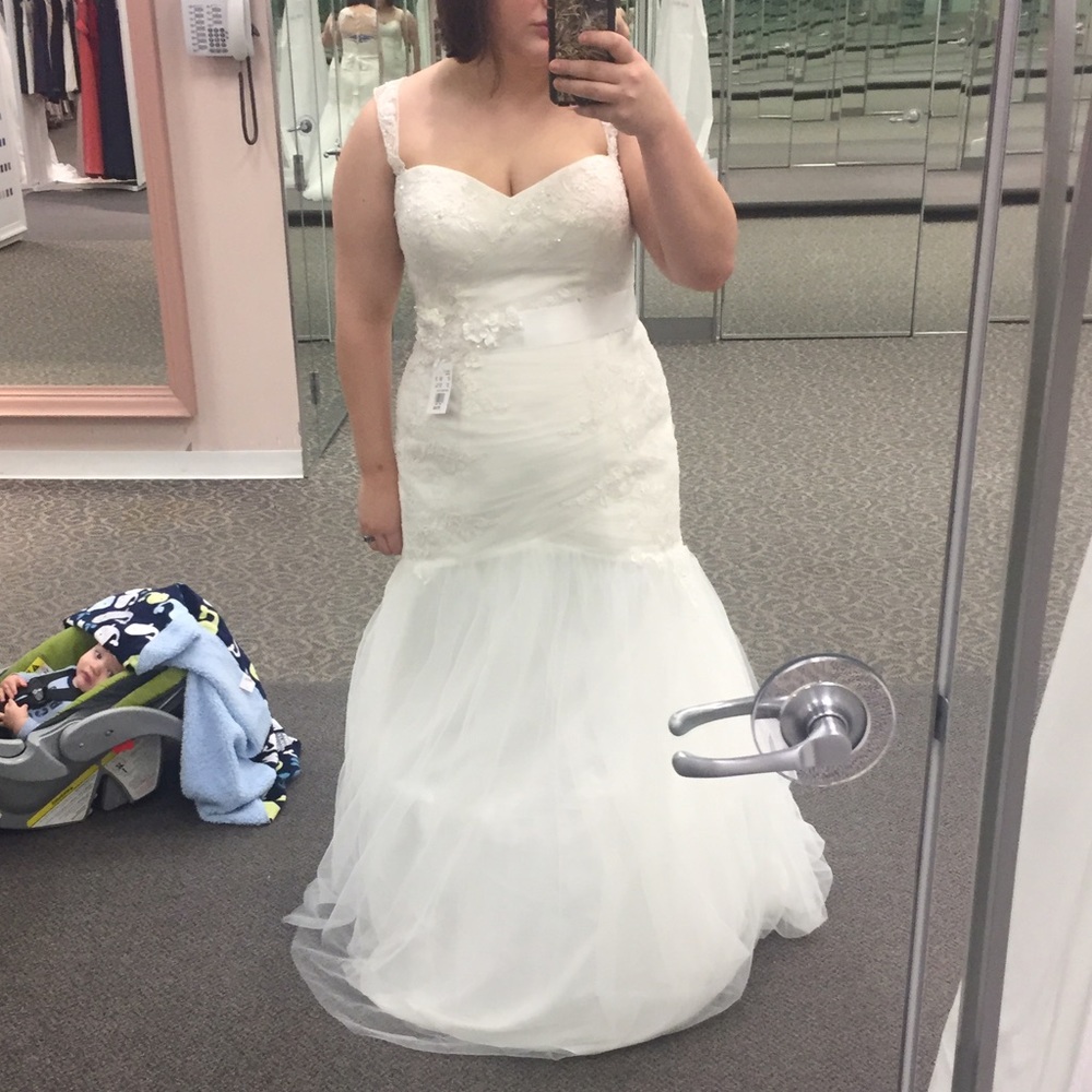 Size 14 wedding dress brand new.