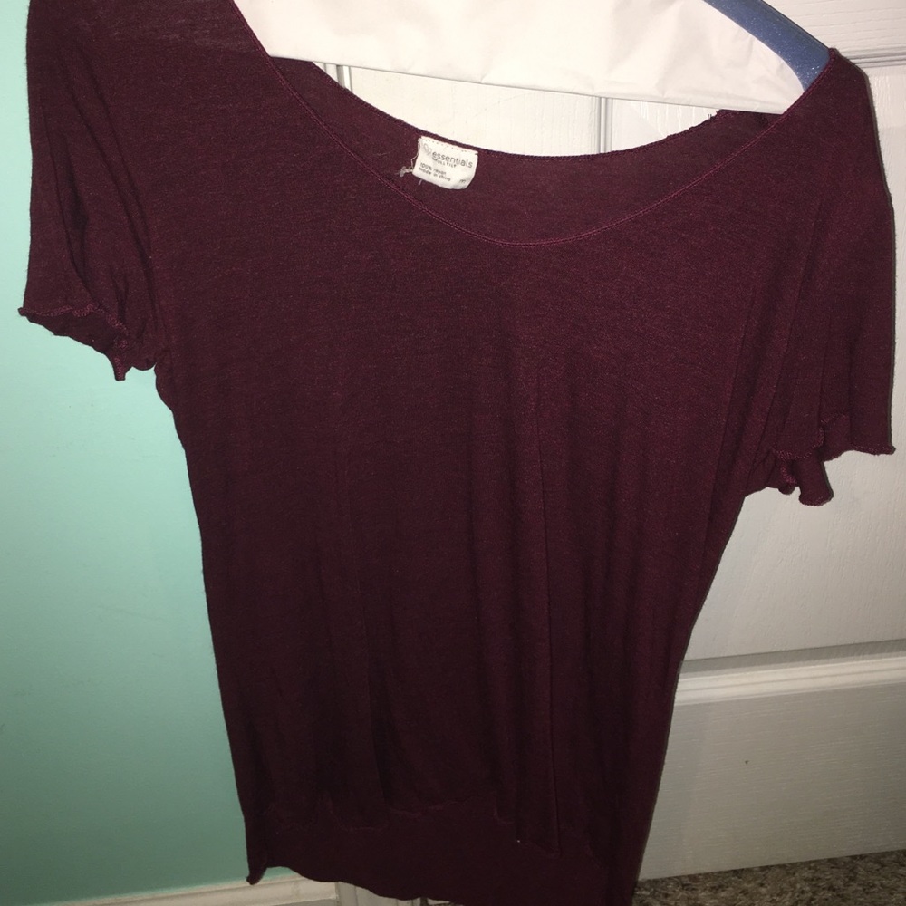 Burgundy colored tshirt.