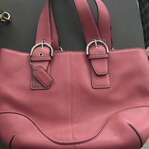 Salmon colored coach bag