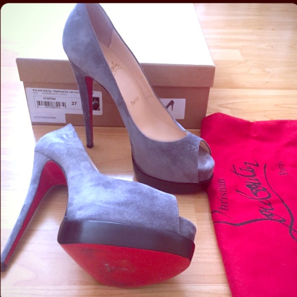 Authentic Christian Louboutin Peep Toe Pumps.
