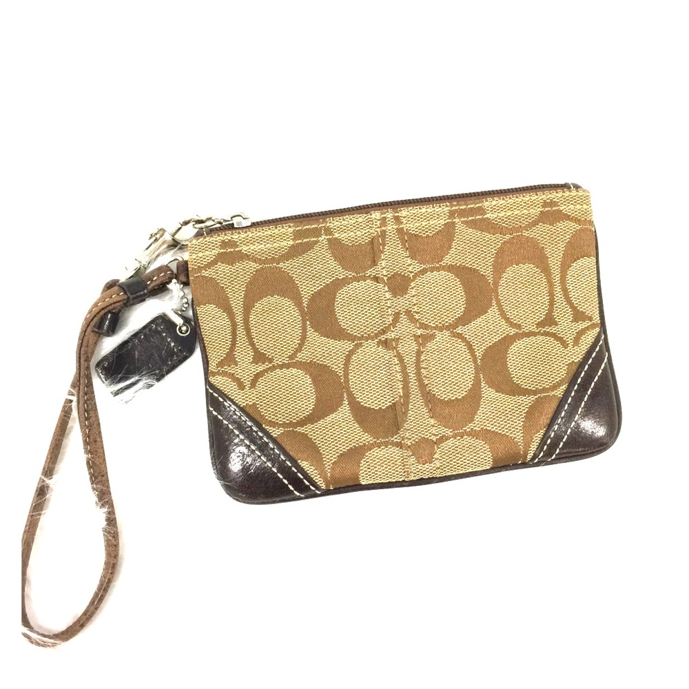 Authentic Coach wristlet.