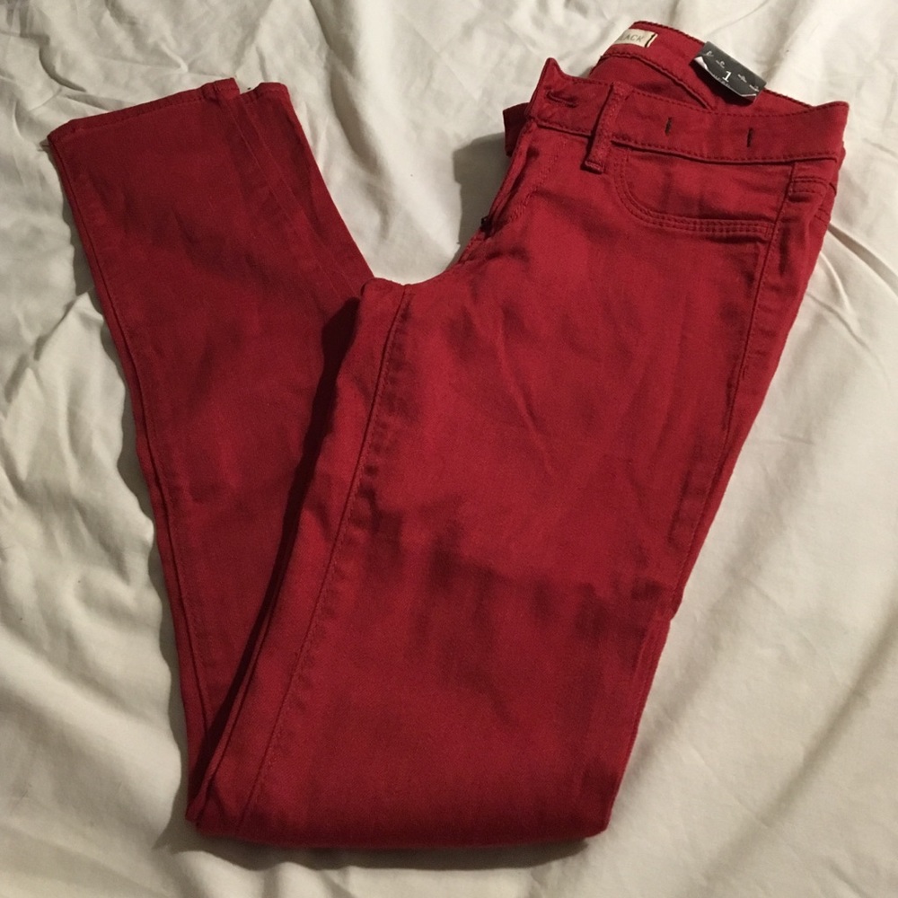 Red skinny jeans