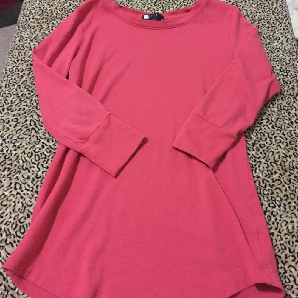 Carole Little orange shirt