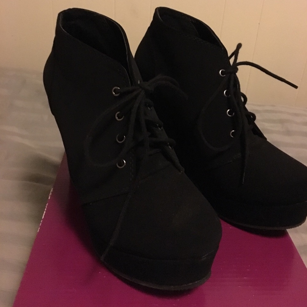 Black wedge booties