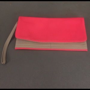 Hot pink and tan clutch