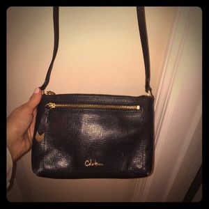 Black leather Cole Haan small cross body bag