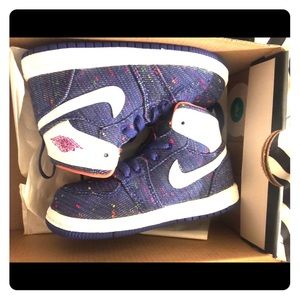 toddler girl multi color Jordan retro high tops.