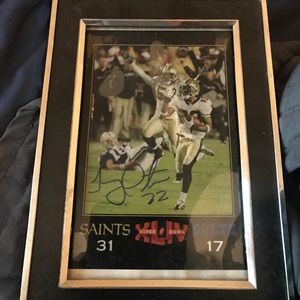 autograph by tracey porter after superbowl game
