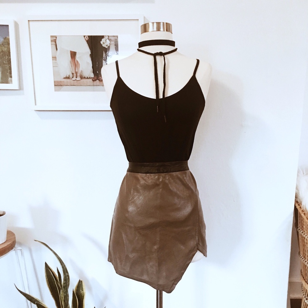 Sultry asymmetrical taupe faux leather skirt