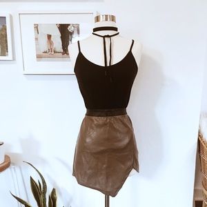 Sultry asymmetrical taupe faux leather skirt