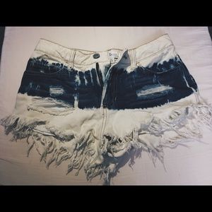 Bleach distressed denim shorty shorts