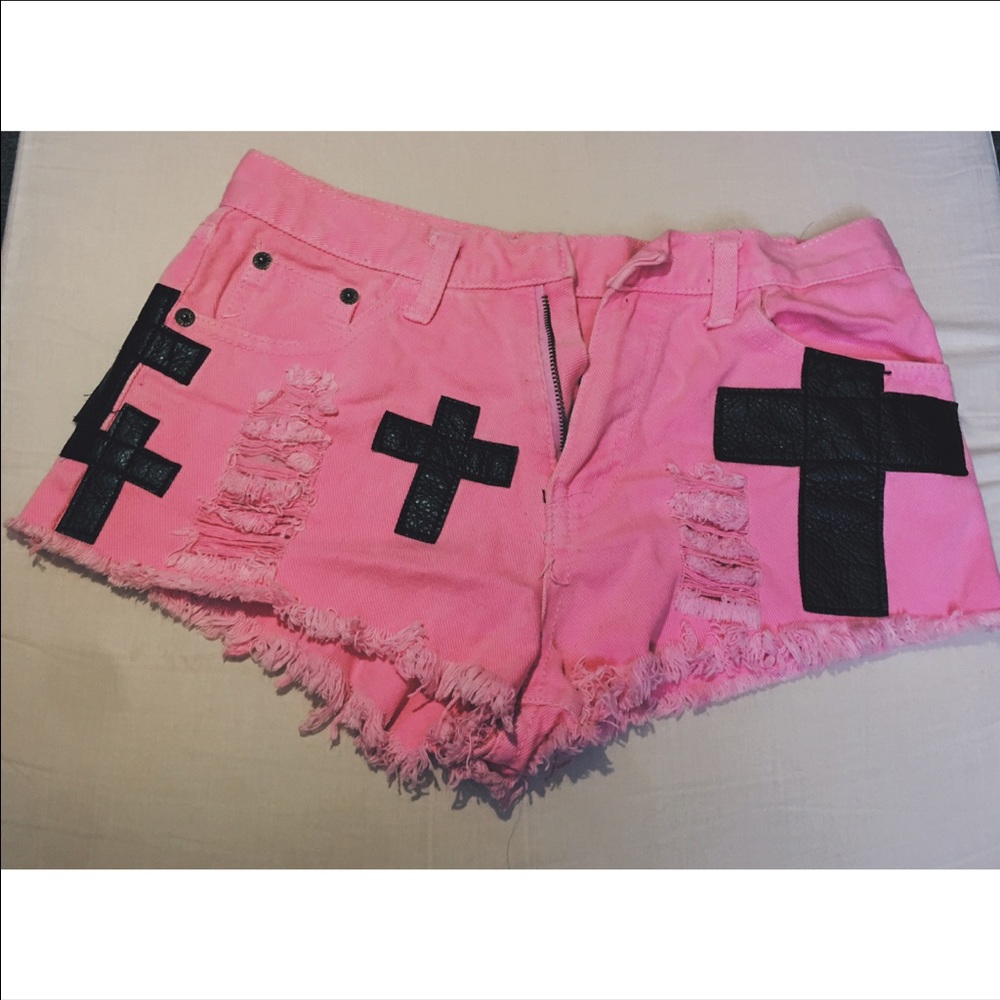 Vintage pink denim shorts with leather patches