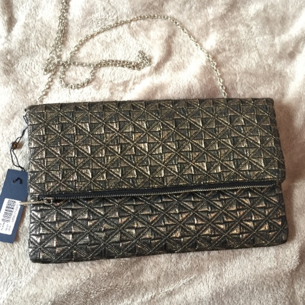 La Regale Metallic fold over clutch