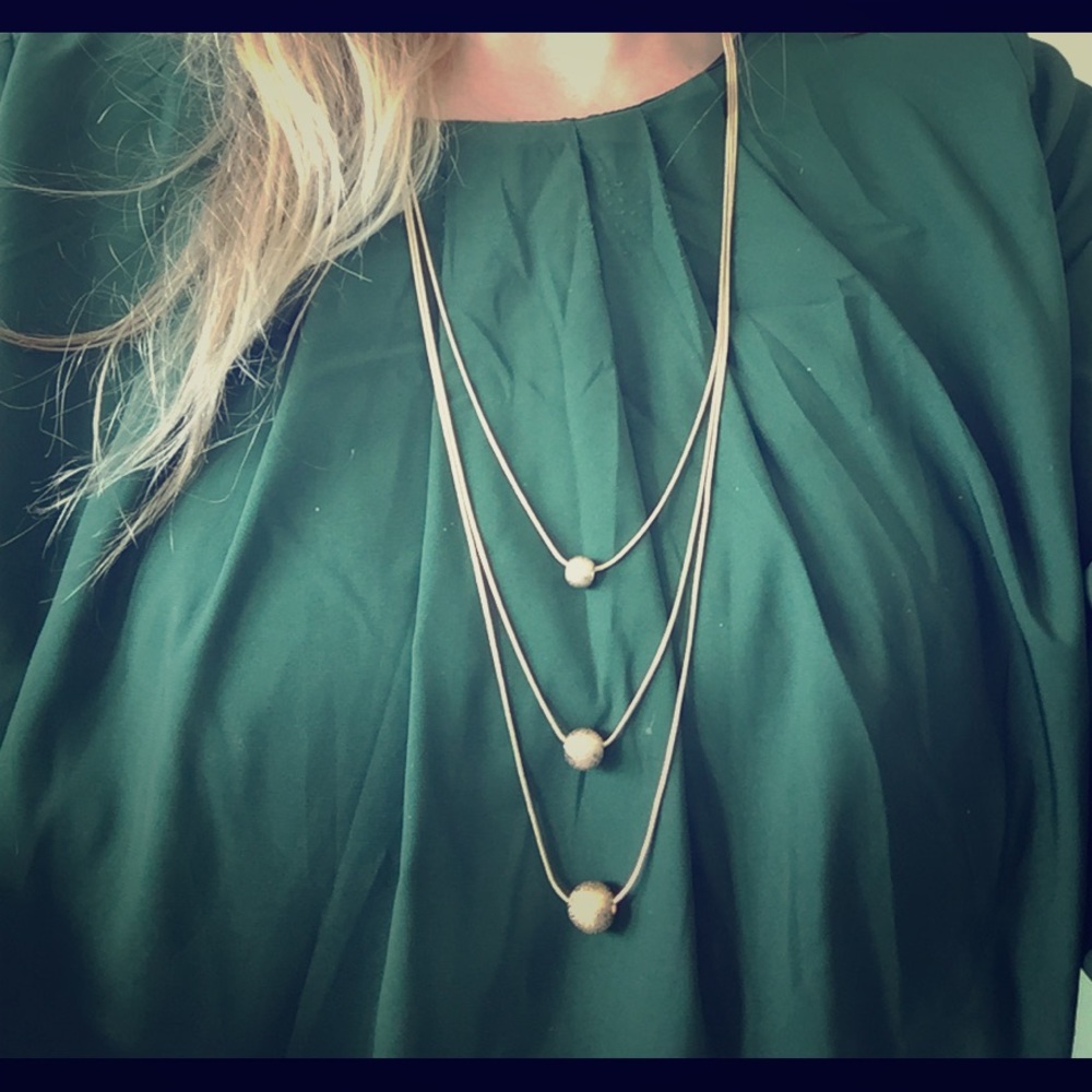 Gold three-tiered necklace