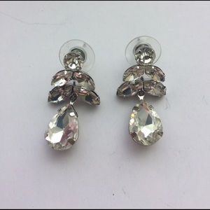 Silver earrings.