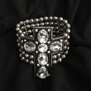 A cross studded bead bracelet